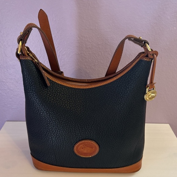 Dooney & Bourke Handbags - Vintage Dooney & Bourke Black and Tan Pebbled Leather Hobo Bag